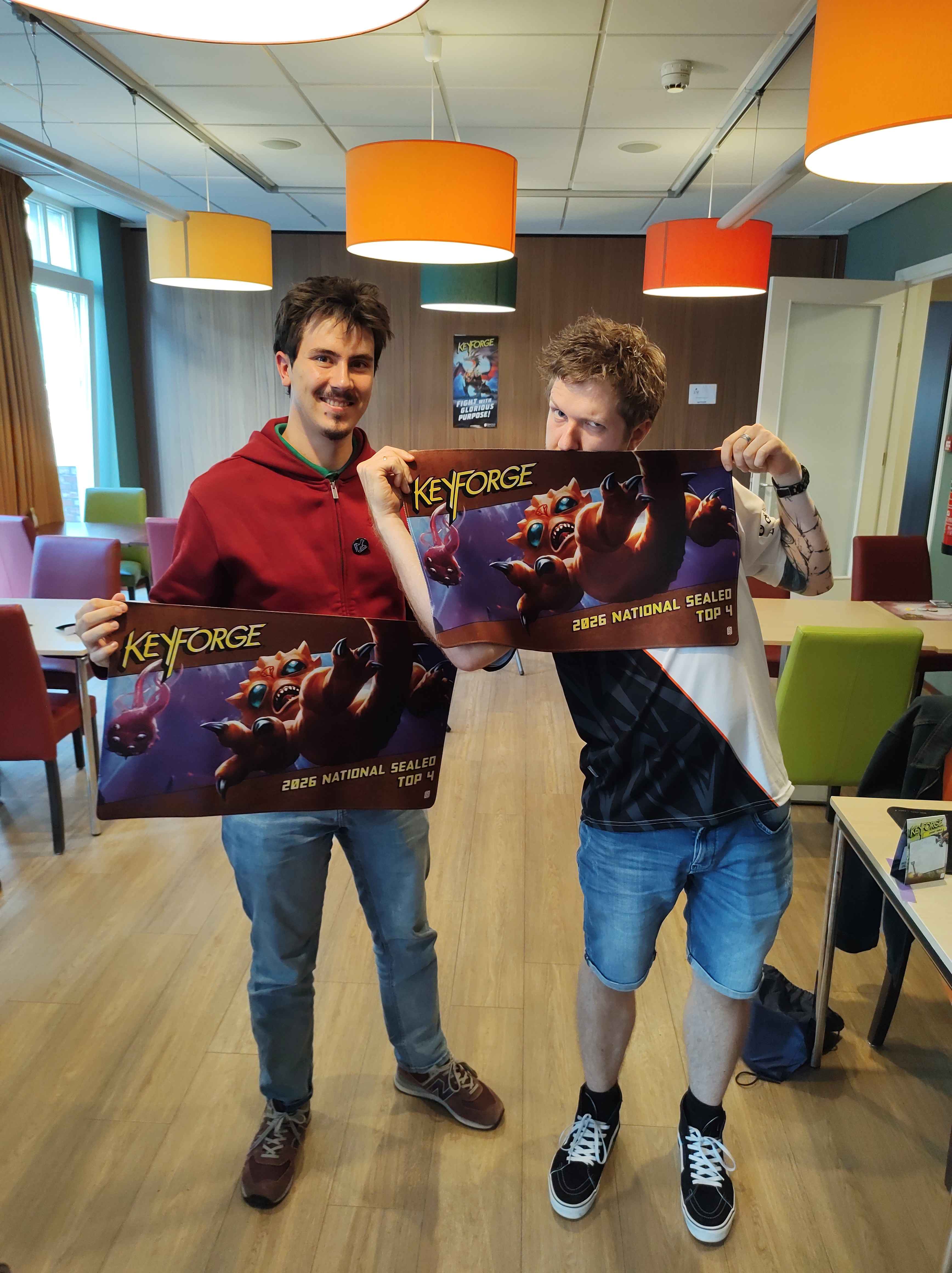 Sealed Top 4 Finalists holding custom playmats